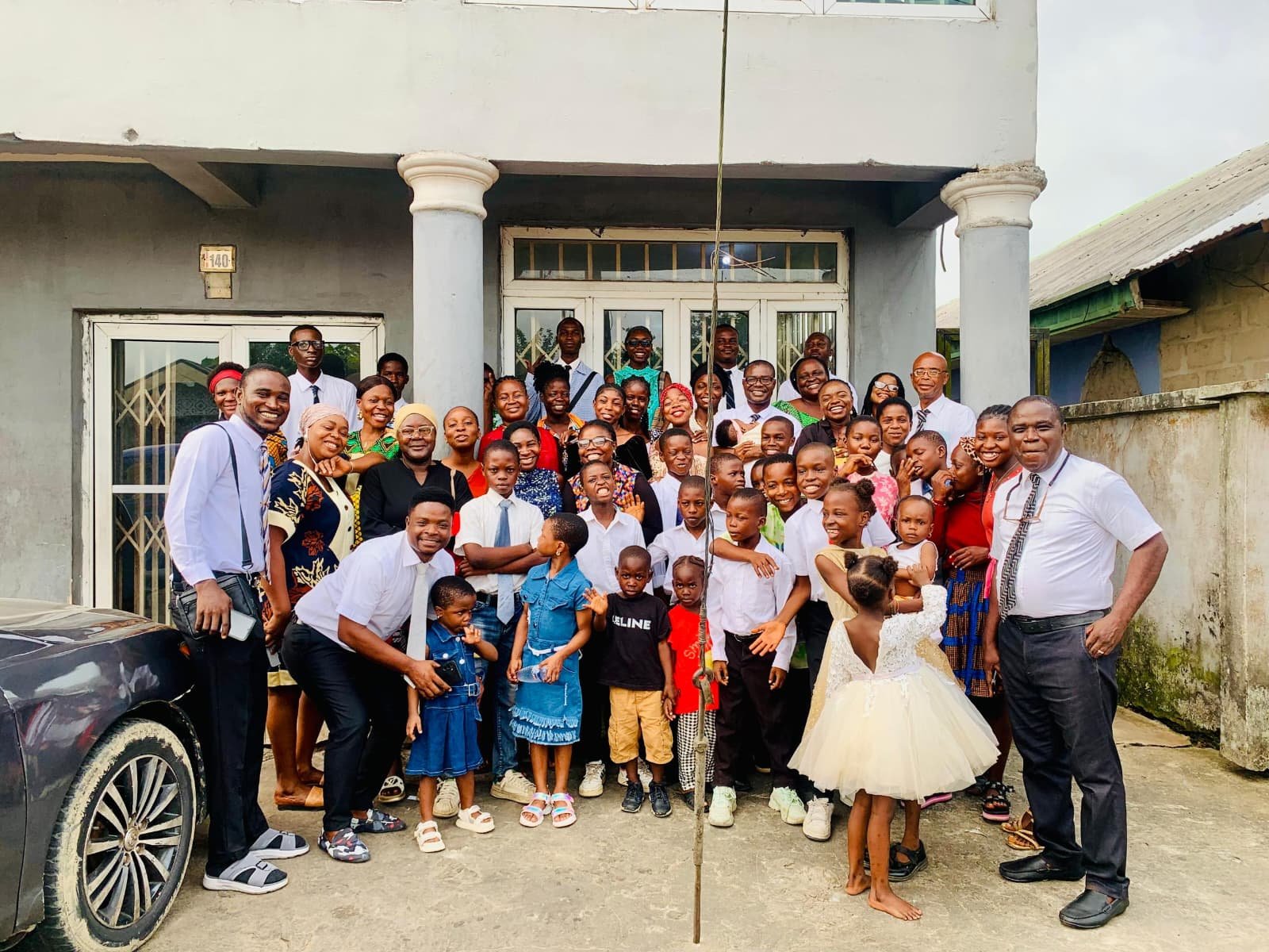 Children, youth, and their church leaders gathered for a group photo