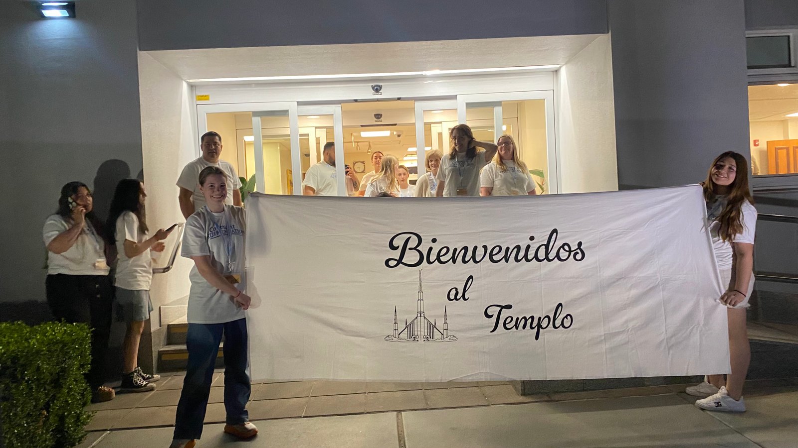 Foundation members warmly welcoming arriving church members