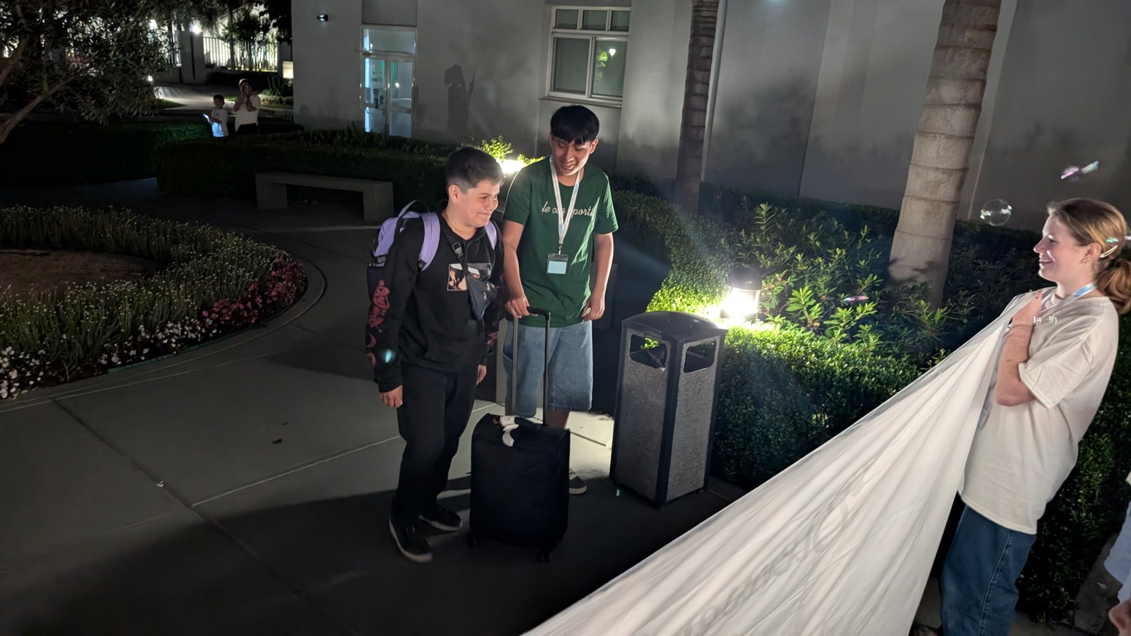 A group of young men arriving together for a church activity